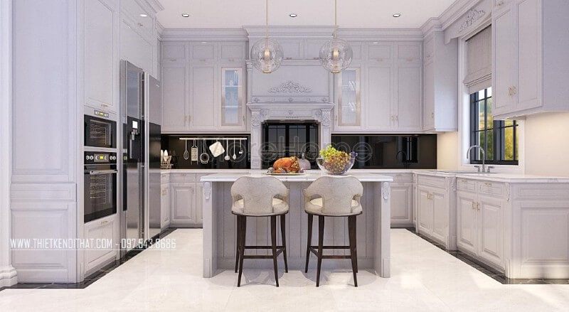 Mẫu tủ bếp biệt thự tân cổ điển được làm từ gỗ tần bì phun sơn màu trắng cao cấp, những nét hoa văn cầu kì, tỉ mỉ tạo nên một không gian cuốn hút mà bất kì ai cũng muốn sở hữu